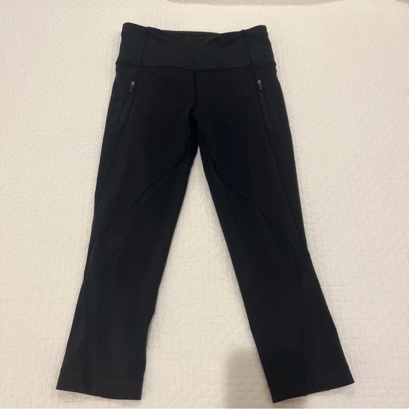 lululemon athletica Black Crop Leggings zipper pockets size 6 - 21” inseam - Picture 1 of 9